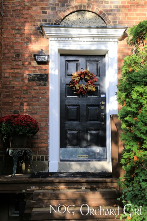 Our Fall wreath hanging on our front door.